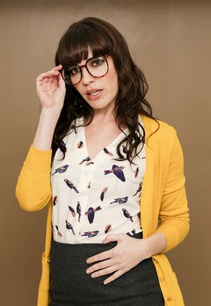 Modest office worker reveals sexy underwear hidden under her usual outfit