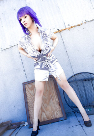 Purple-haired diva with drenched breasts Larkin Love undresses on the roof