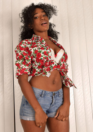 Black teenage with curly hair and furthermore round butt opens her pinky flower spreading labia