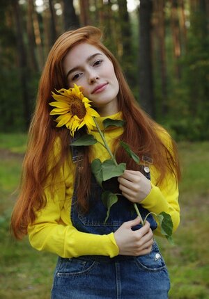 Ginger with red hair on the head & pubis undresses at the picnic