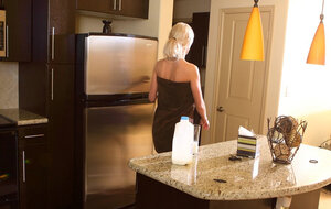 Blonde adult actress with love bubbles shows how she prepares for a day of work