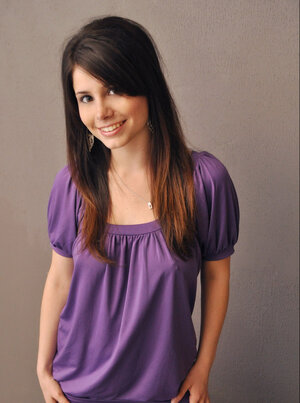 Pretty brunette lassie flashes upskirt sexy bum and also teases with naked jugs