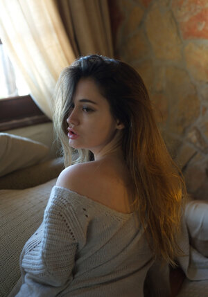 Luscious brunette starlet in stockings reveals sizeable natural jugs and also cunny