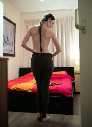 Underweight gal with natural tits is going to tease the camera