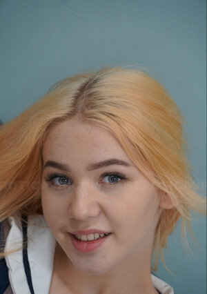 Sexy blonde schoolgirl Dina Soul plays with her sex toys