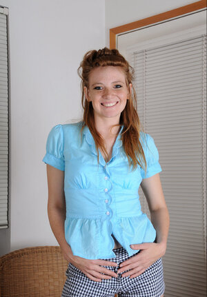 Cheeky seductress named Tabitha shows her ginger bush up close