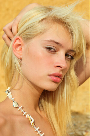 18-19 year old beauty Ivetta A enjoys displaying her slightly fat body on the beach