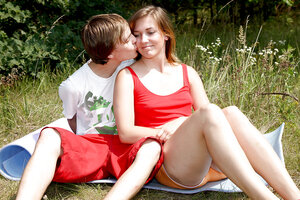 Aroused teenage brunette Bella E indulges in outdoor pussy licking and plus making love