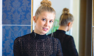 Eyla Moore rides a suction vibrator in a bathroom