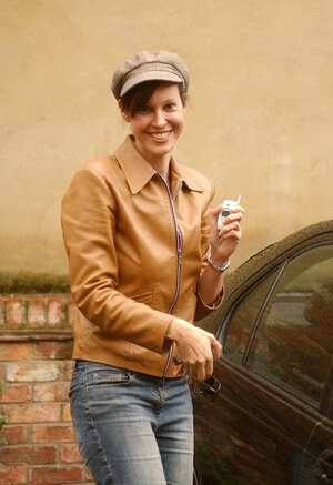 Amanda Swan strips her sexy lingerie to expose her large hooters