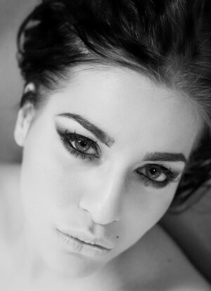 Eveline Dellai is a underweight kitten in black who takes hard cum cannon