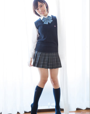 Nice-looking Japanese schoolgirl likes to show off her perky tits