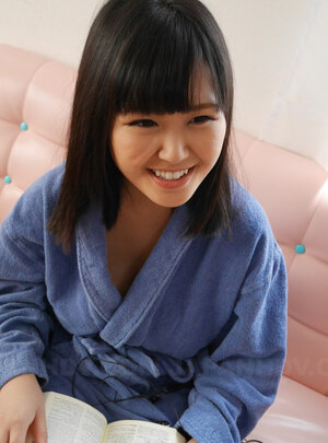 Mayu Kawai fingers her depilated vagina and additionally shows off her big tits
